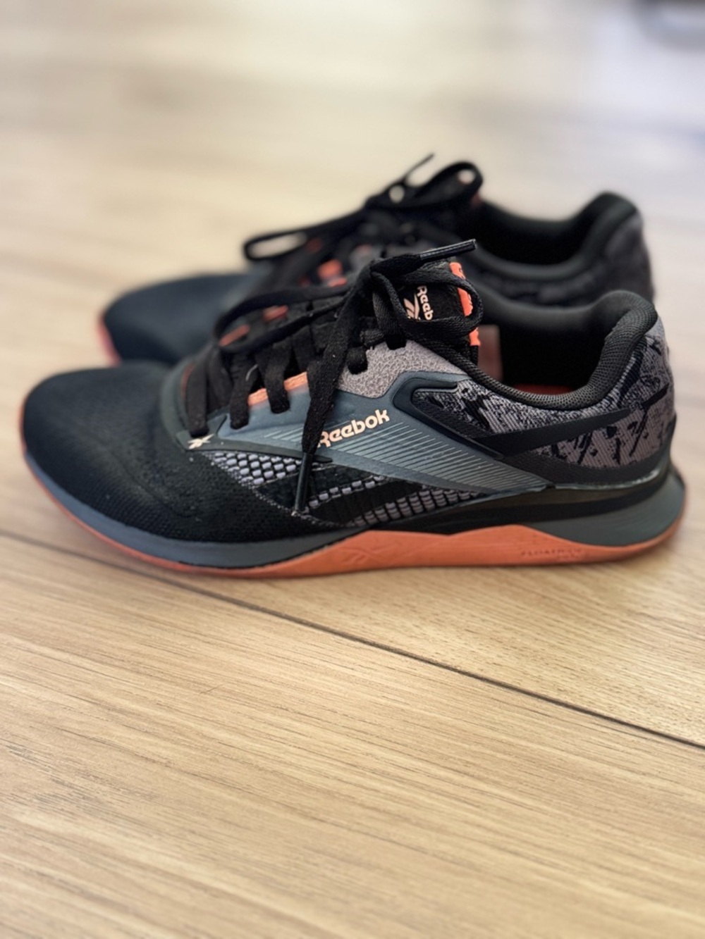 Reebok Black and Coral Low-Top Training Shoes